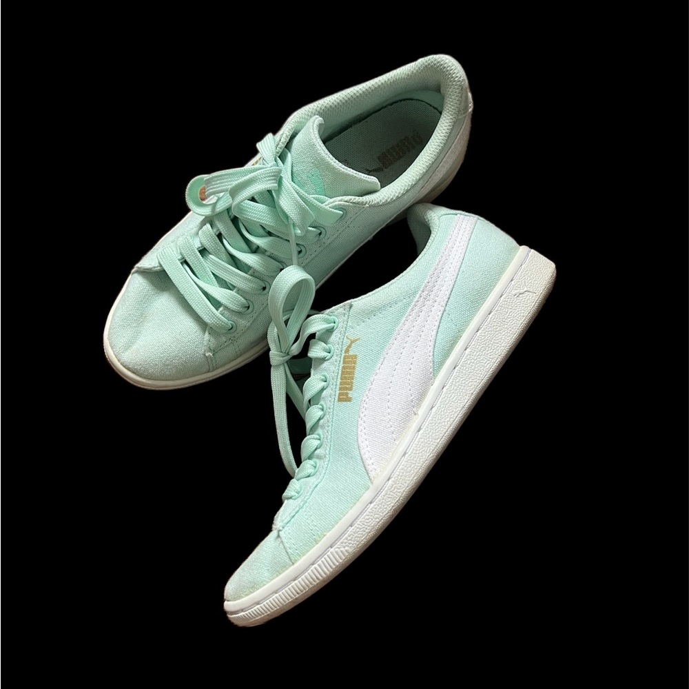 Mint color women’s Puma sneakers